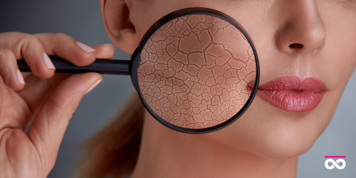 skincare myths debunked - woman holding magnifier to face to show damage