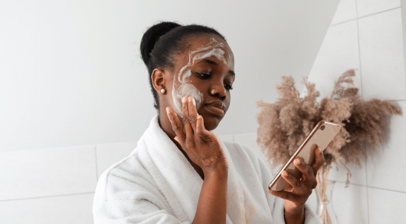 Young girl cleansing face