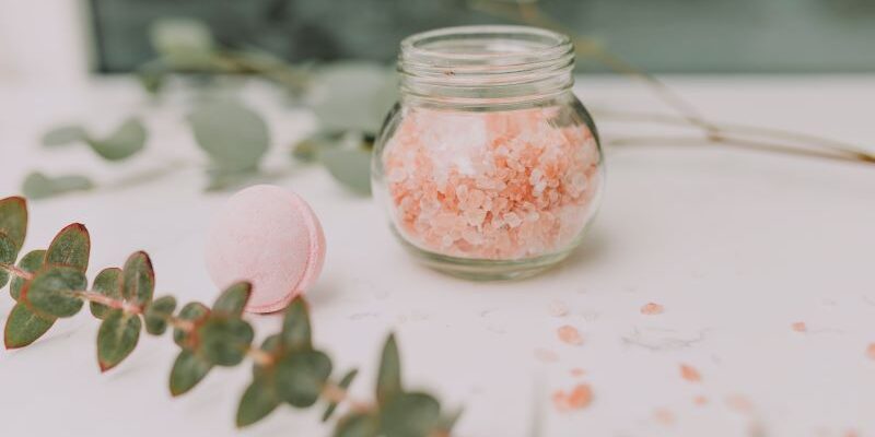 Pink Color Crystal Exfoliator in a Glass Bottle
