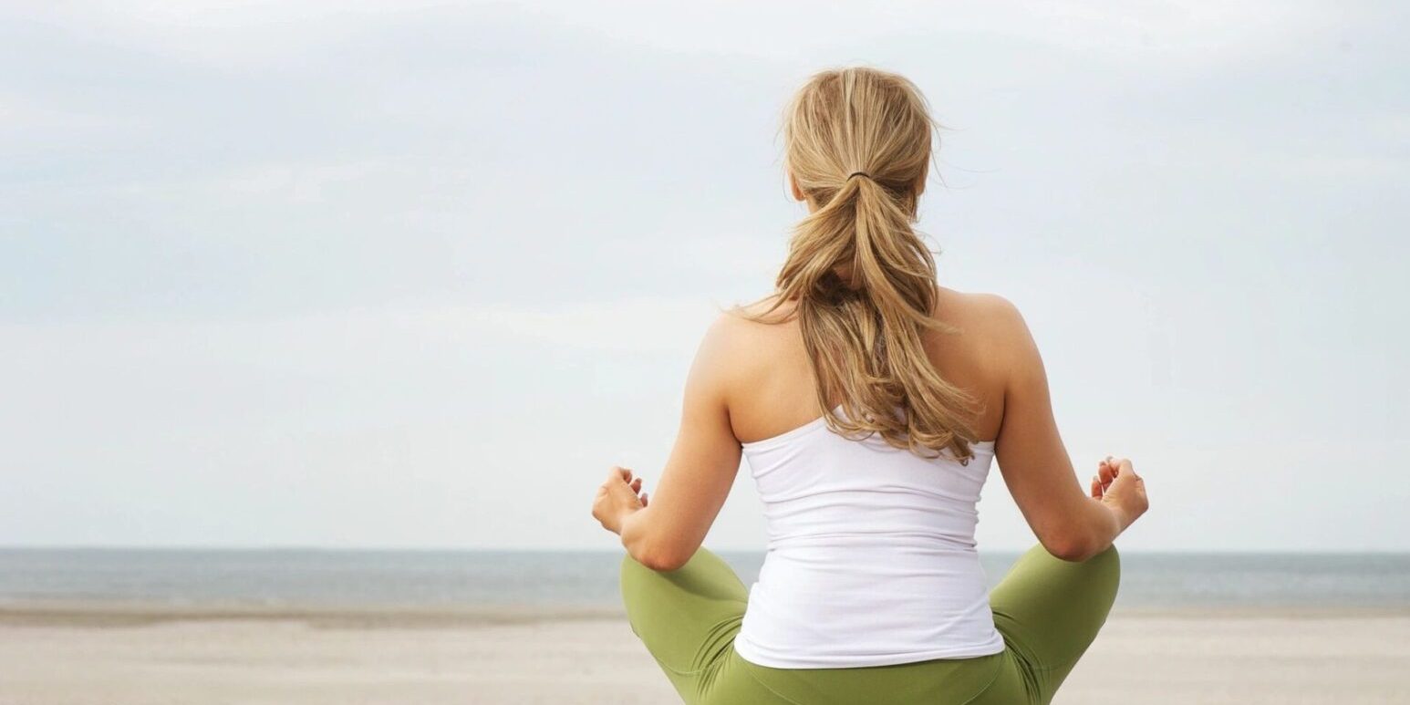 Woman sitting on a mat